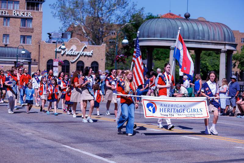 American Heritage Girls Troop 224 walks in  the Memorial Day parade on Monday, May 25,2026 in St. Charles.