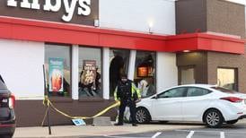 Photos: Car strikes Arbys in Peru