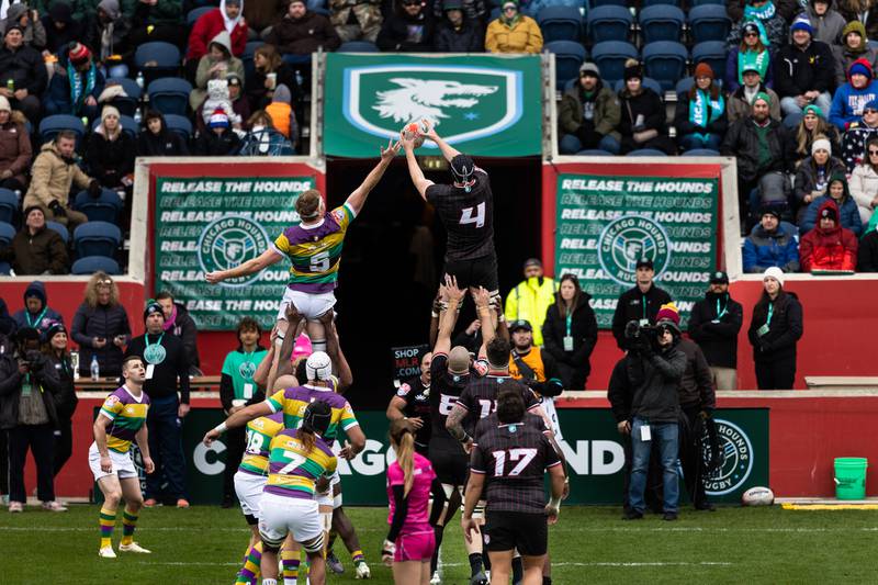 New Orleans Gold's second row Liam Hallam-Eames  (5) tries to swipe the ball away from Chicago Hounds' second row Cameron Dodson  (4) on a lineout during a Major League Rugby match at Seat Geek Stadium in Bridgeview, on Sunday April 23, 2023.