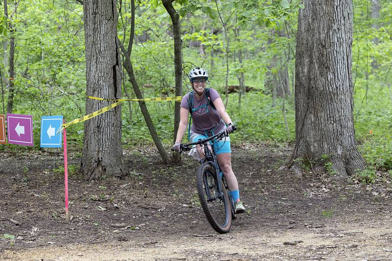A trail rider makes her way through a portion of the course Saturday, May 13, 2023 at Lowell Park. Riders could choose from trails that were six, 10 or 13 miles longer. There were also three road courses that were also run.