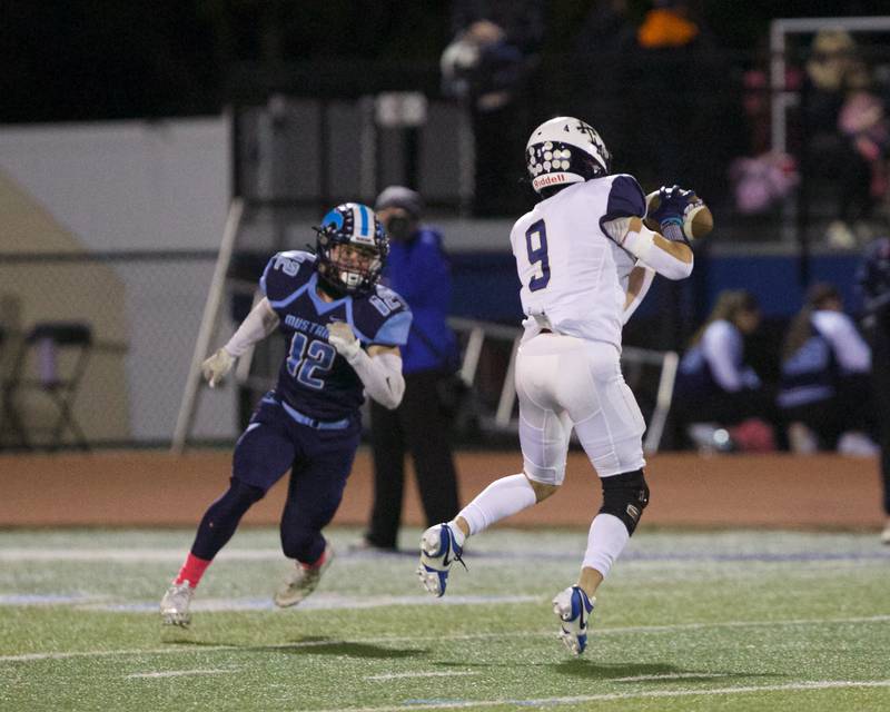 Addison Trails Noah Cruz makes the catch against Downers Grove South on Friday, Oct.20,2023 in Downers Grove.