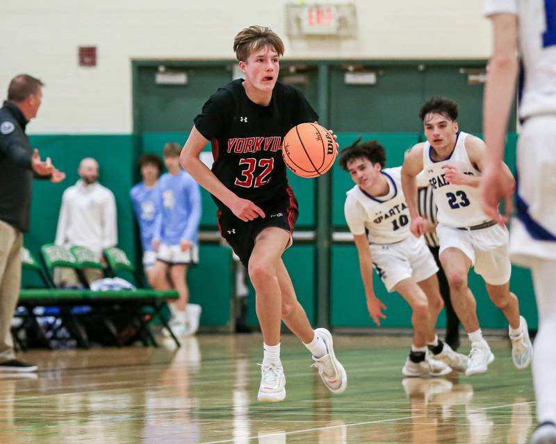 Yorkville's Joey Jakstys (32) races down the court during their Jack Tosh Holiday Classic basketball tournament game between St Francis at Yorkville Thursday Dec 26, 2024 in Elmhurst.