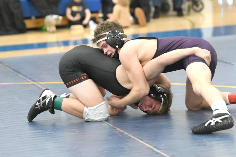 Dixon's Austin Hey (145 pounds) wrestles Byron's Jacob Rose at the 1A Wrestling Regional at Eastland High School on Saturday, Feb. 4.