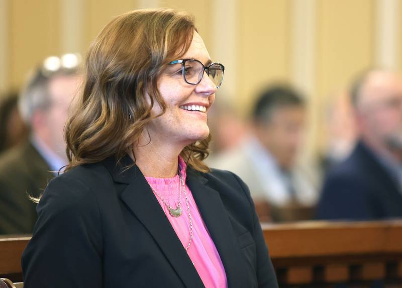 Jill K. Konen smiles as retired judge Ronald G. Matekaitis makes some remarks before she is sworn in as an associate judge of the 23rd Judicial Circuit Court Friday, Sept. 23, 2022, at the DeKalb County Courthouse in Sycamore.