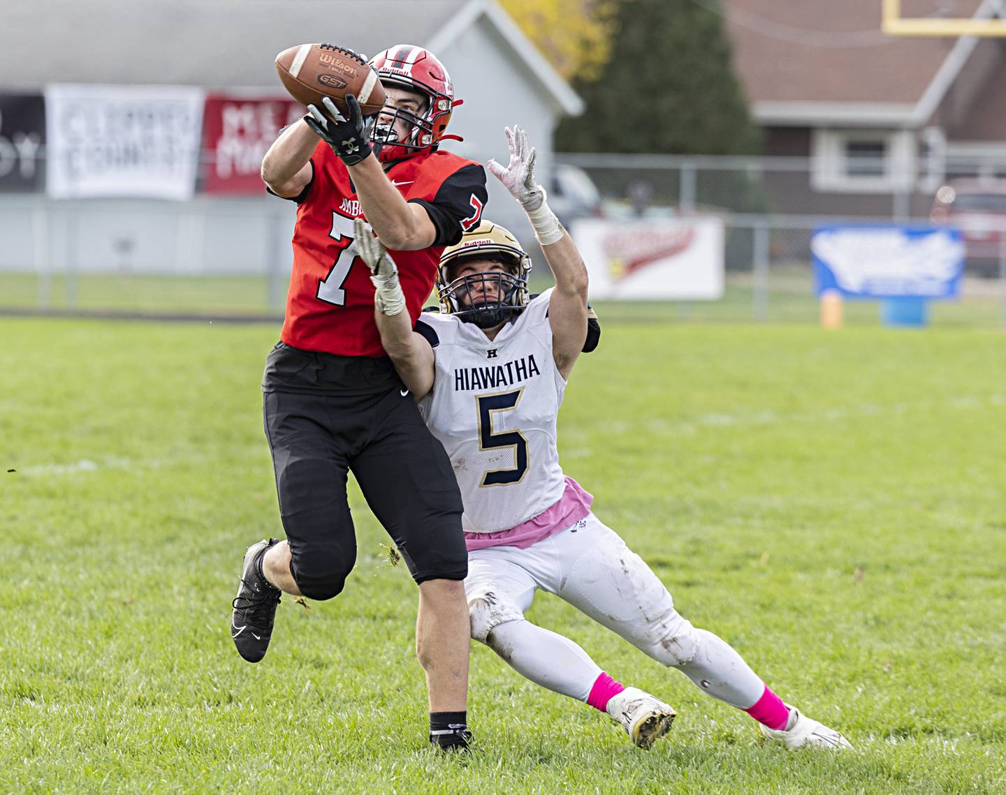 Amboy’s Troy Anderson snags an interception in front of Hiawatha’s Ryan Barber Saturday, Oct. 28, 2023 in the I8FA playoffs in Amboy.