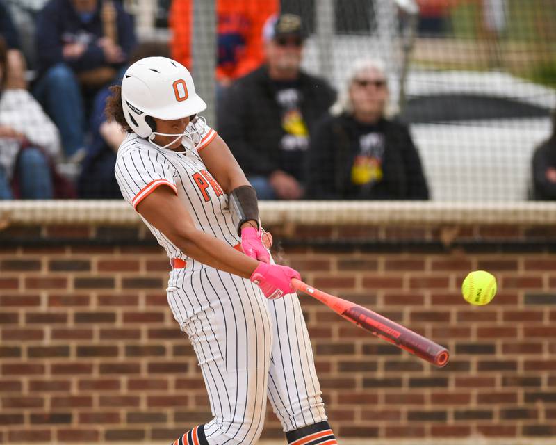 Oswego's Ahlivia East (8) makes contact with the ball but was thrown out at first during the regional final game on Friday May 22, 2026, while taking on Benet Academy held at Oswego High School.
