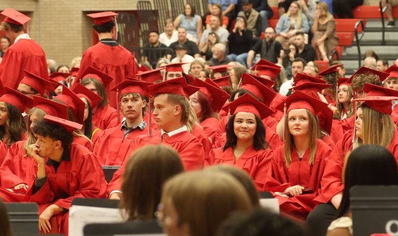 Ottawa High School Class of 2026 graduates take their seats during the commencement ceremony in Kingman Gymnasium on Friday, May 22, 2026 at Ottawa High School