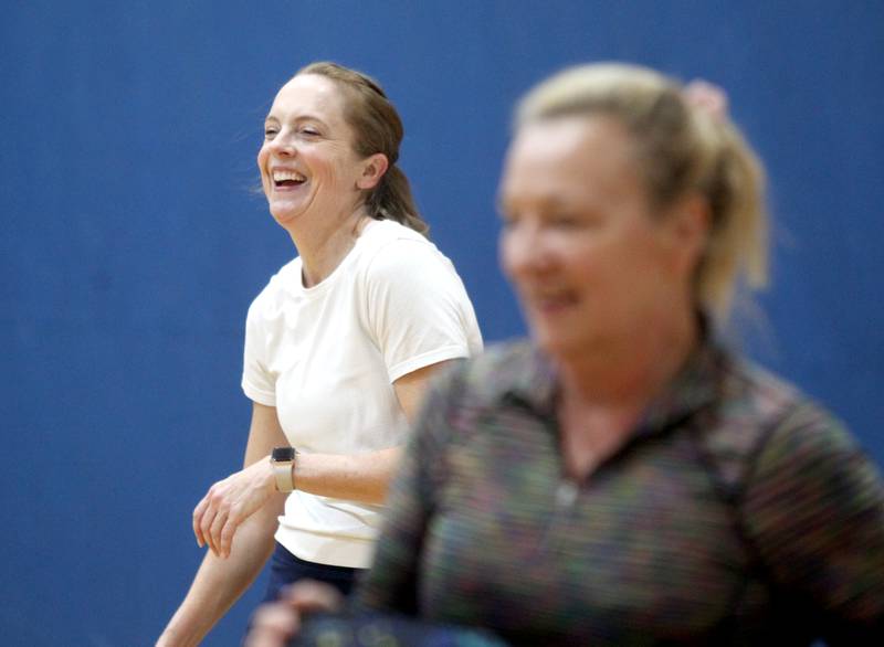 Heather Anaya shares a laugh while playing pickle ball during an open gym session at the Stephen D. Persinger Recreation Center in Geneva on Jan. 12, 2023.