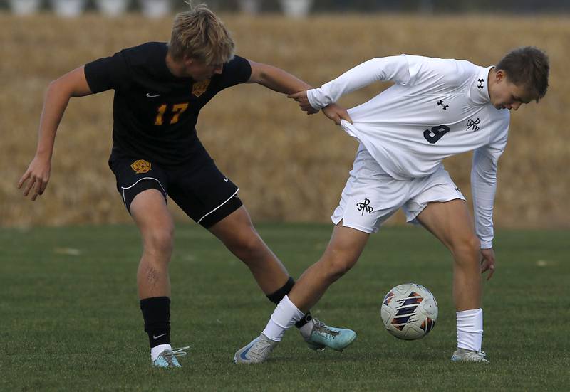 Richmond-Burton's Joseph Kyes tries to pull F.W. Parker's Johnny Backx off the ball during an IHSA Class 1A Johnsburg Sectional semifinal match on Oct. 28, 2025, at Johnsburg High School.