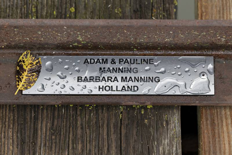 One of the name plates on a repaired plank seen on Thursday, July 30, 2025.