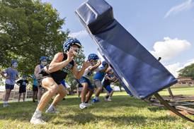 Photos: Newman football takes the practice field