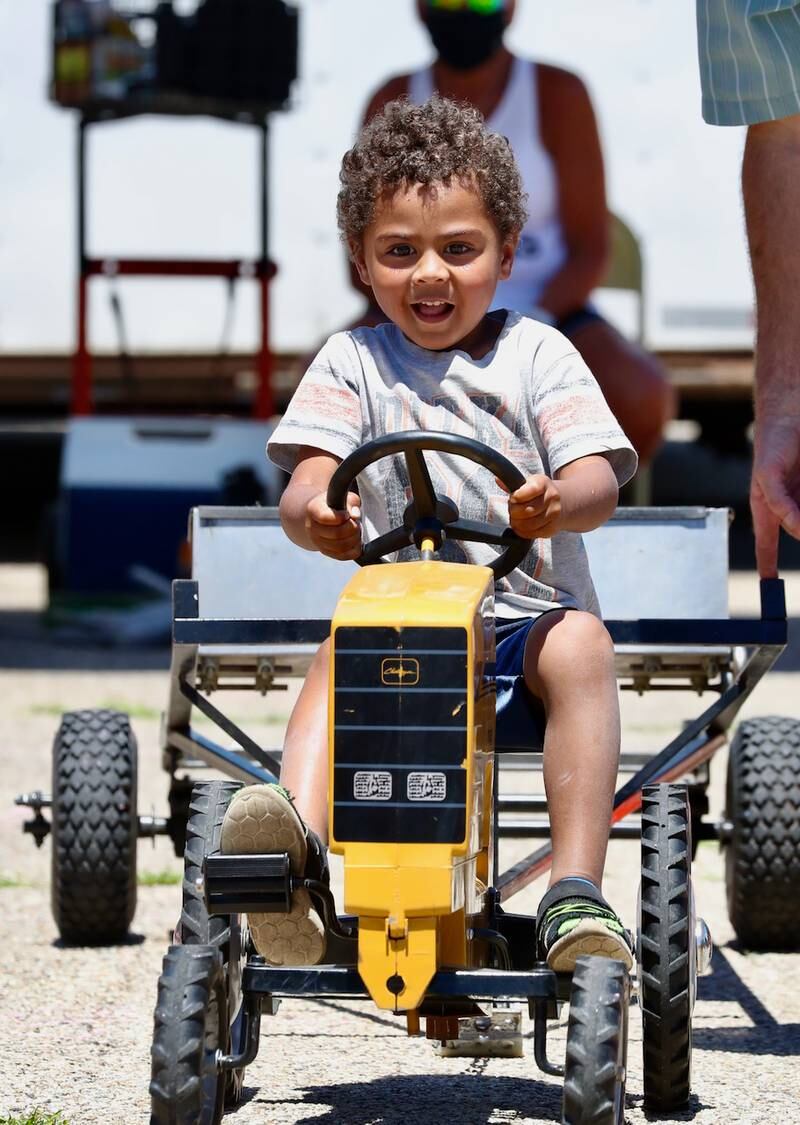 Kids were able to drive around individual tractors during Beef and Ag Days.
