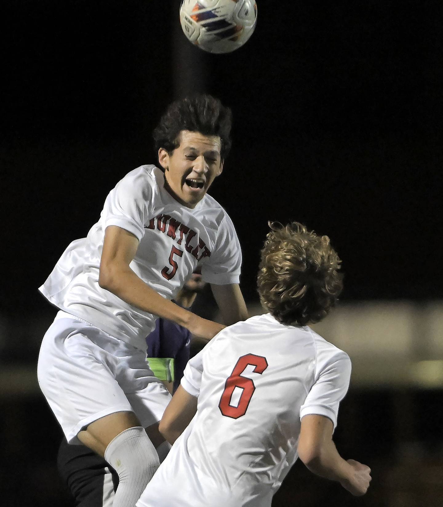 Huntley’s Noah Gomez heads the ball in an IHSA Class 3A boys soccer sectional semifinal game against Hampshire in Streamwood on Oct. 30, 2024.