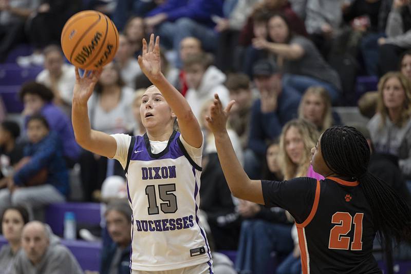 Dixon’s Morgan Hargrave puts up a shot against Byron Saturday, Dec. 27, at the Duchesses Basketball Christmas Classic.