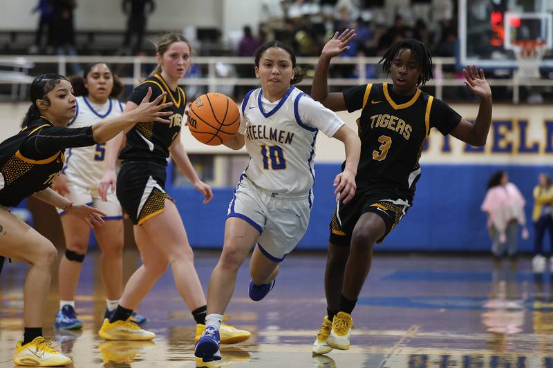 Joliet Central’s Elena Moody drives to the paint against Joliet West on Thursday, Jan. 15, 2026 in Joliet.