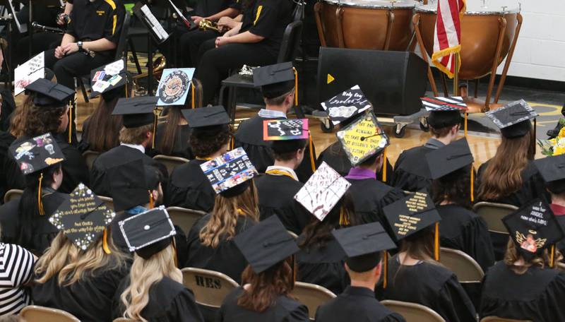 Putnam County graduates show their decorative caps while attending the Class of 2023 graduation ceremony on Sunday, May 21, 2023 at Putnam County High School.