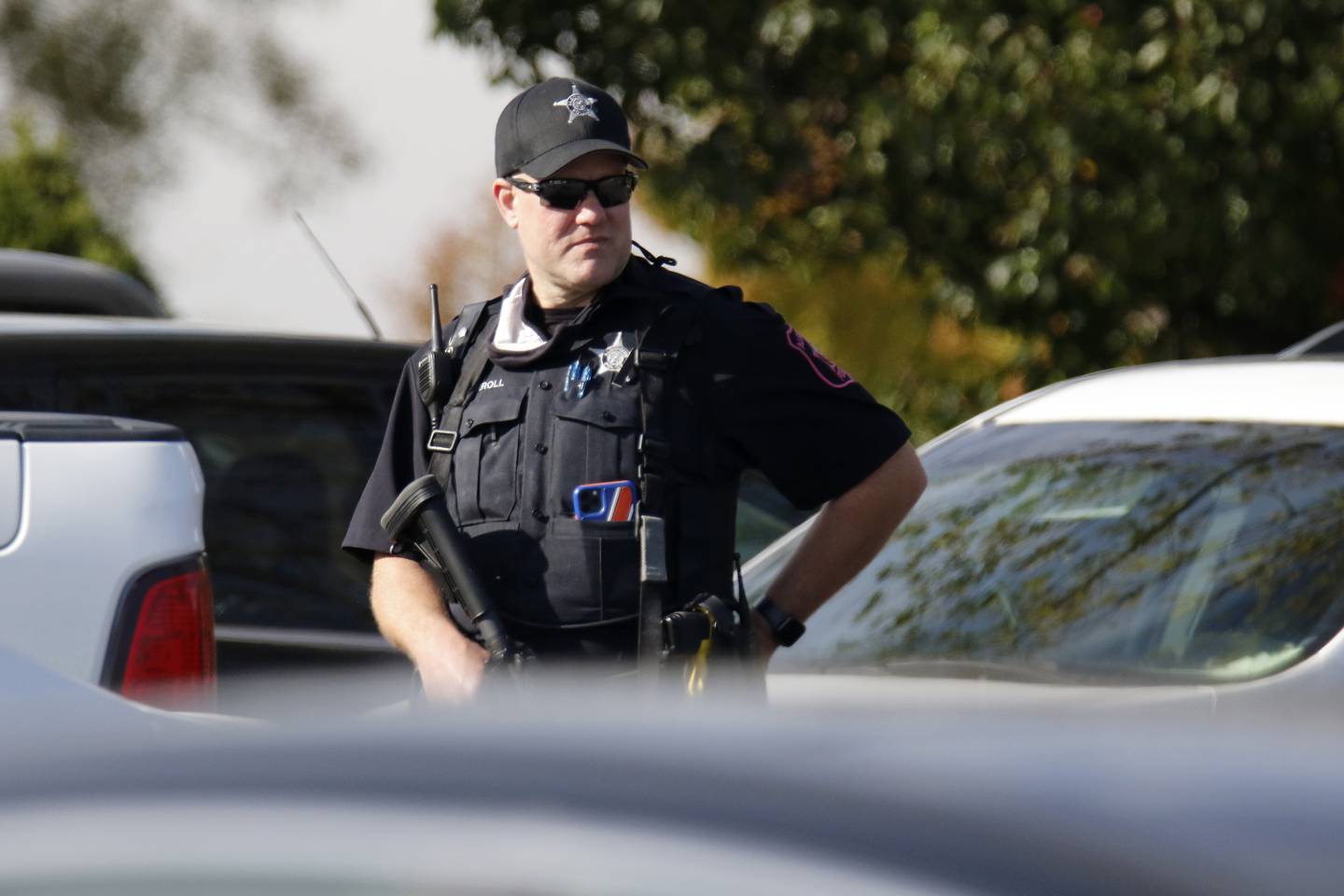 Police, sheriff's deputies, and law enforcement in SWAT gear were on hand to handle a situation Wednesday, Oct. 27, 2021, at the Holiday Inn Express across from Jacobs High School in Algonquin.