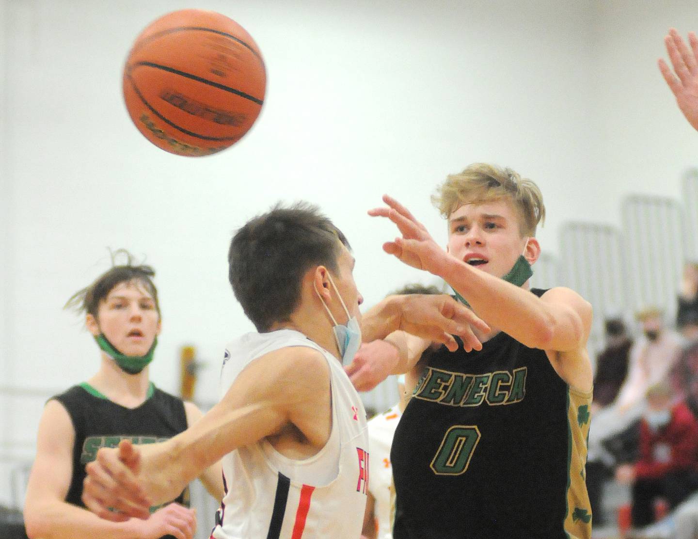 Seneca's Paxton Giertz (0) passes in the Marseilles Holiday Tournament championship game against Flanagan-Cornell on Thursday, Dec. 30, 2021.