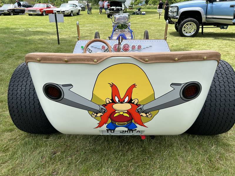 This 1925 Ford J dragster, owned by Neil Hambly of Yorkville was one of the 137 vehicles that took part in the Lyndon Car Show on Sunday, June 2, 2024 at Richmond Park in Lyndon. The dragster had Yosemite Sam on its front and back with a signature license plate.