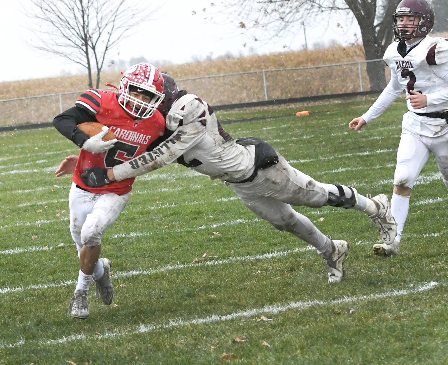 Forreston's McKeon Crase fights off Dakota's Thomas Bowman during 1A playoff action in Forreston on Saturday, Nov. 12.