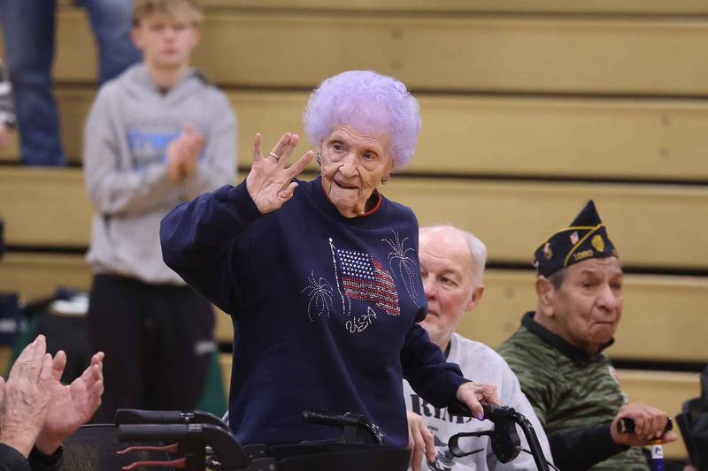World War II veteran Betty Peterson is introduced at the Lockport Township High School 10th Annual Veterans Night Celebration on Friday, Dec. 6, 2024.