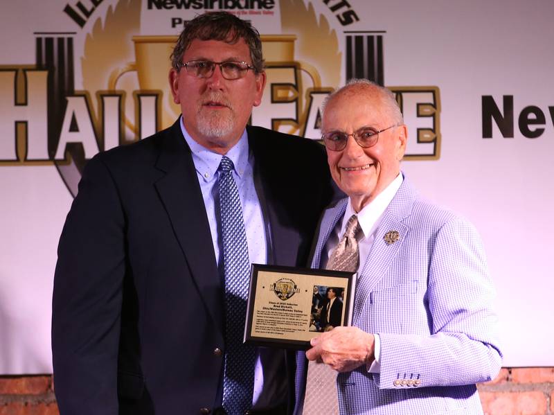 Brad Bickett poses with Lanny Slevin Emcee during the Shaw Media Illinois Valley Sports Hall of Fame on Thursday, June 8, 2023 at the Auditorium Ballroom in La Salle. Bickett was the star player on the 1985-1986 Ohio basketball team who finished state runner-up.