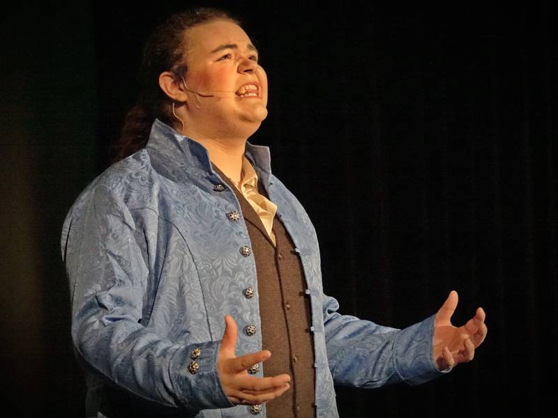 Adrian Silva (Valjean) acts out a scene in the musical "Les Miserabels" on Tuesday, March 13, 2024 in Matthiessen Memorial Auditorium at La Salle-Peru Township High School.