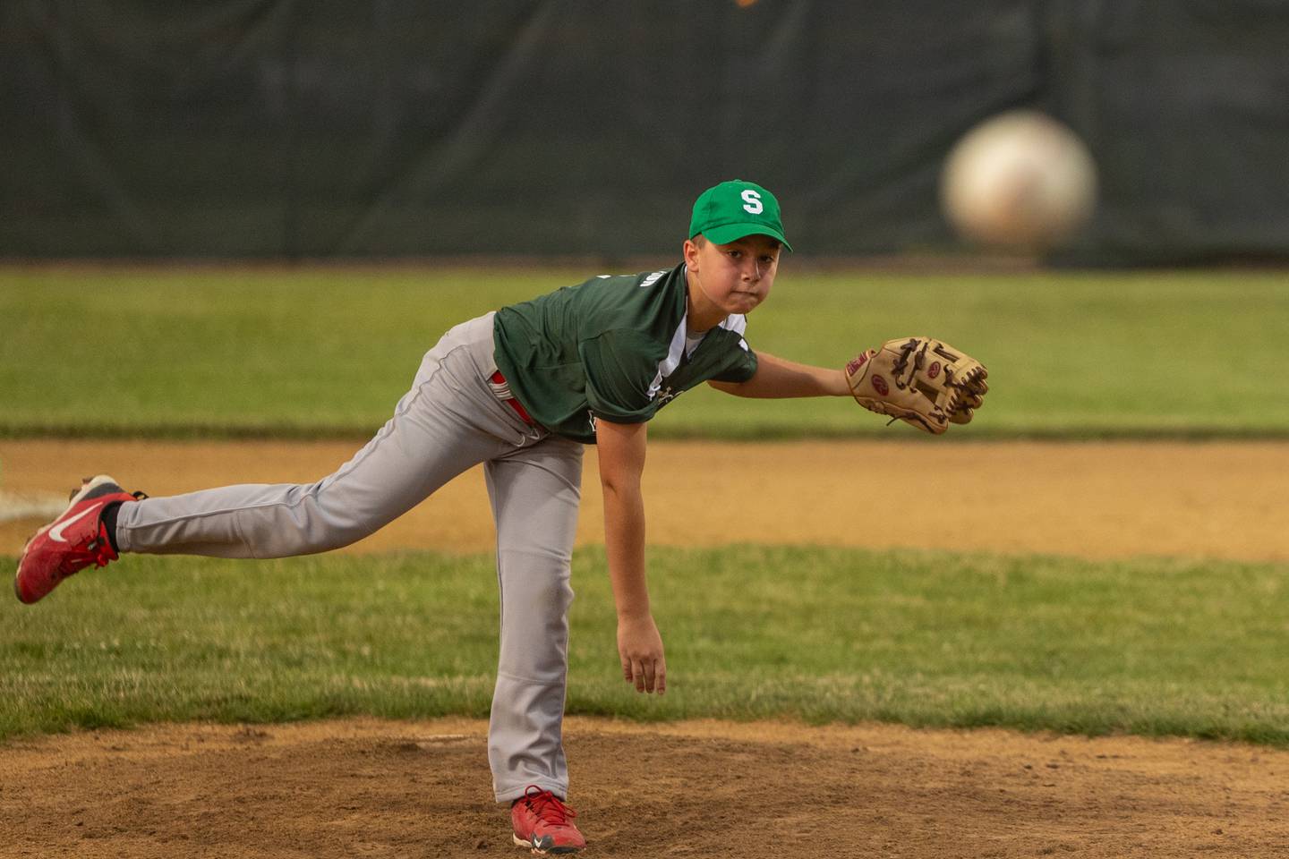 Rhett Lepper (11) of Hatzer & Sons pitches Wednesday, June 25, 2025, at Southside Park in Streator.