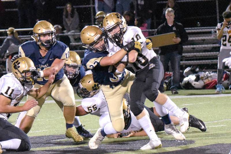 Lemont linebacker Cade Campos takes down his Oak Forest opponent during the homecoming game on Friday, September 29th. Lorae Mundt - For Shaw Media