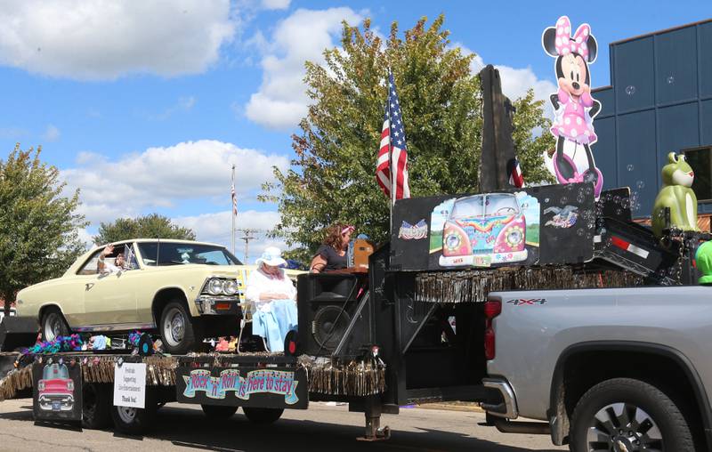 A Rock and Roll float passes down South Main Street during the 54th annual Homestead Festival parade on Saturday, Sept. 6, 2025 in Princeton.