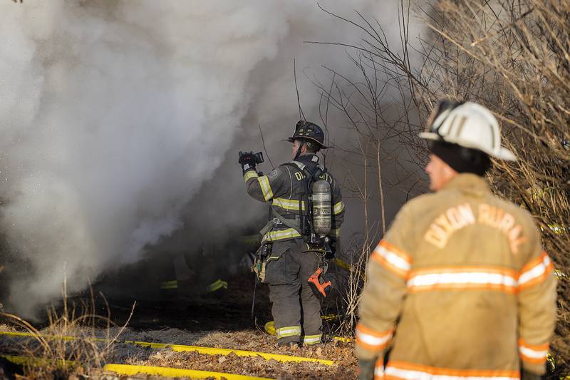 Firefighters work the scene of a fire Sunday, Jan. 19, 2025, at 550 Mill Street in Emerson.