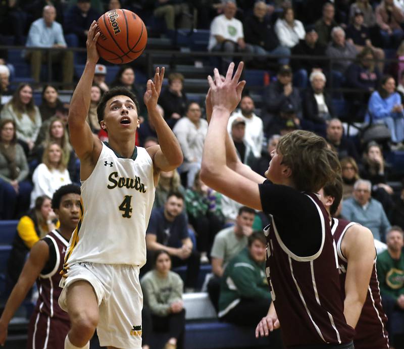 Crystal Lake South's AJ Demirov drives to the basket against Wheaton Academy during the IHSA Class 3A Cary-Grove Boys Basketball Regional Championship game on Friday, Feb. 23, 2024 at Cary-Grove High School.