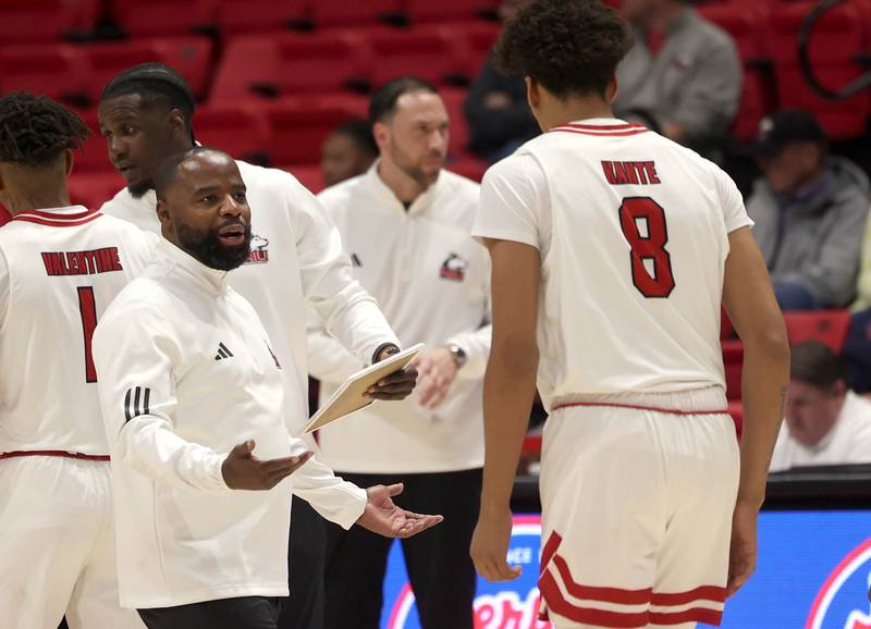 Northern Illinois head coach Rashon Burno talks to forward Ladji Kante Monday, Nov. 3, 2025, during their game against Louisiana-Monroe at the Convocation Center at NIU in DeKalb.