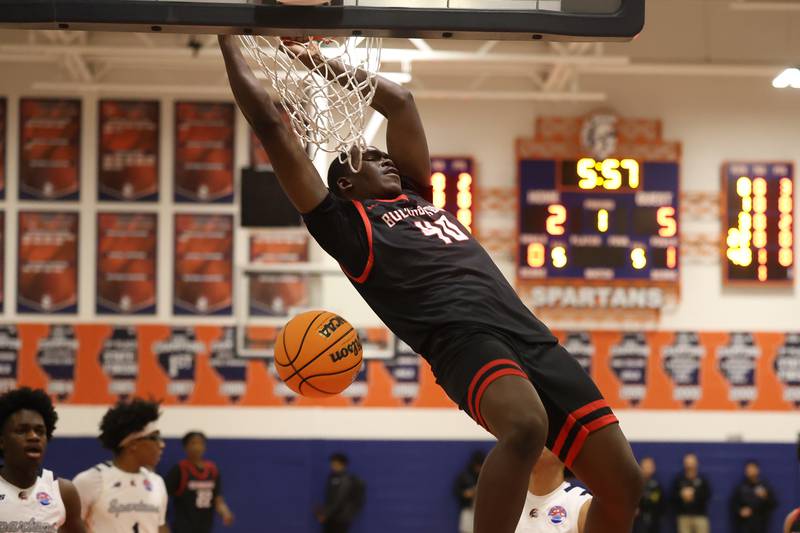 Bolingbrook's Elijah Anderson throws down a dunk against Romeoville on Tuesday, Dec. 2, 2025 in Romeoville.