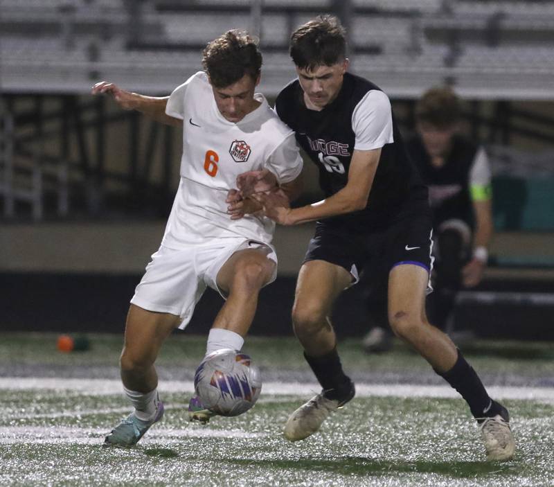Crystal Lake Central's Nick Pagonis battles with Prairie Ridge's Chase Santucci for th ball during the IHSA Boys Soccer 2A Grayslake Central Sectional semifinal match on Tuesday, Oct. 29, 2024, at Grayslake Central High School,
