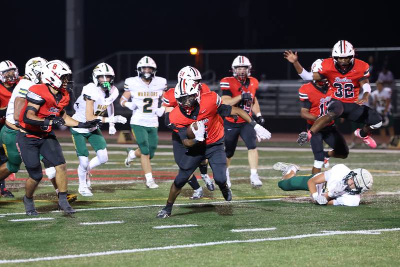 Bradley-Bourbonnais' Rontez Smith breaks away from defenders for a first down during the Boilermakers' 35-6 victory over Waubonsie Valley Friday, Sept. 12, 2025.