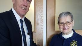 Rock Falls Rotary presents Paul Harris lapel to Rotarian member