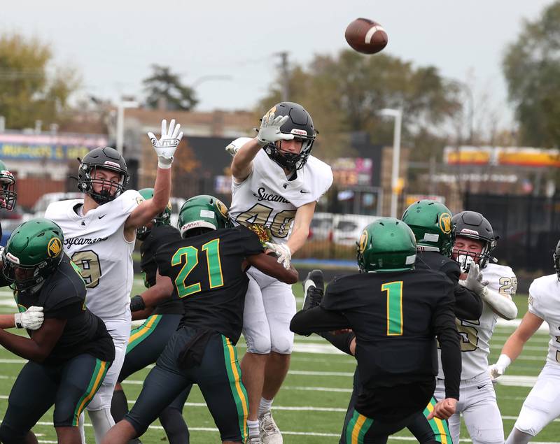 The Sycamore punt return team nearly blocks the kick of Westinghouse's Mario Zavala Saturday, Nov. 9, 2024 during their Class 5A second-round playoff game at Knute Rockne Stadium in Chicago.