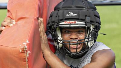 Photos: Dixon football takes the field