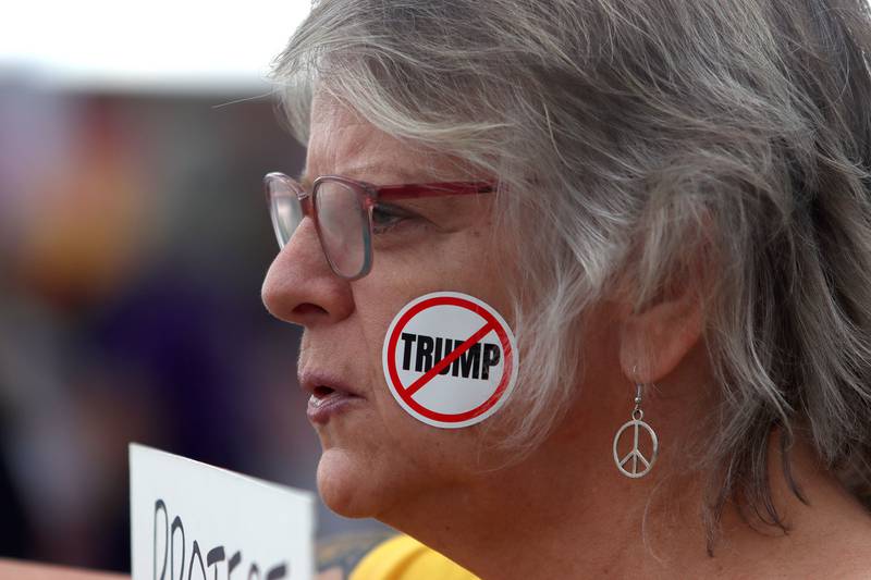 Kathy Cyscon of Woodstock participates during the “Good Trouble Lives On” protest along Route 14 in Crystal Lake on Thursday, July 17, 2025.
