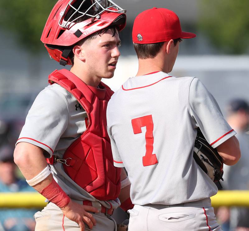 Ottawa catcher Adam Swanson goes to the mound to visit with pitcher Lucas Farabaugh during their game against Sycamore Tuesday, May 6, 2025, at the Sycamore Community Sports Complex.