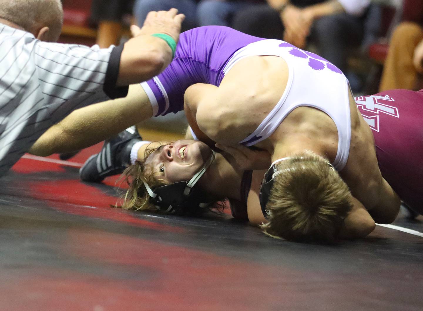 Prairie Ridge’s Jacob Meade is pinned by Hampshire’s Jasper Hintz at 165 pounds in varsity boys wrestling on Thursday, Dec. 4, 2025, at  Prairie Ridge High School in Crystal Lake.