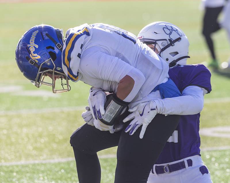 Maroa-Forsyth's Grady Rose secures a pass against Wilmington Friday, Nov. 28, 2025, in the Class 2A football finals at Hancock Stadium at ISU.