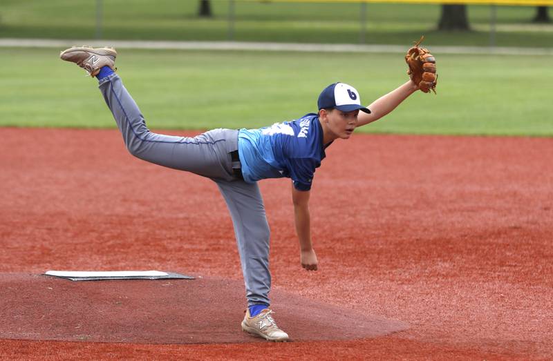 Beisebol pitcher Guilhesme Oyama watches his pitch during the opening round of the Under 13 McHenry County Youth Sports Association’s Summer International Championship baseball tournament on Friday, July 11, 2025, at the Mickey Sund Baseball Complex in Crystal Lake's Lippold Park.