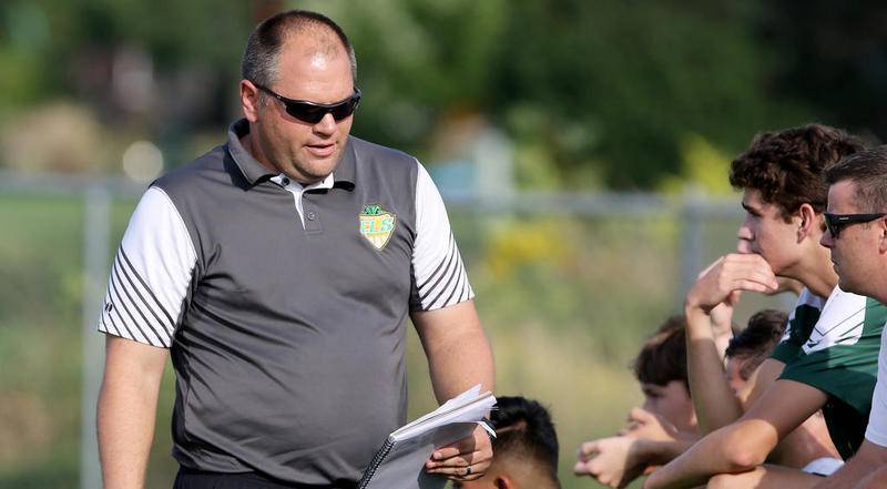Crystal Lake South coach Brian Allen goes over the plays during their boys soccer game against Prairie Ridge at Crystal Lake South High School on Tuesday, Sep. 10, 2019 in Crystal Lake.  Crystal Lake South beat Prairie Ridge 4-1.