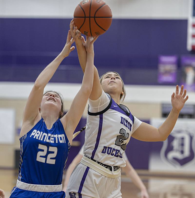 Princeton’s Miyah Fox and Dixon’s Reese Dambman go up for a loose ball Thursday, Jan. 4, 2024 at Dixon High School.