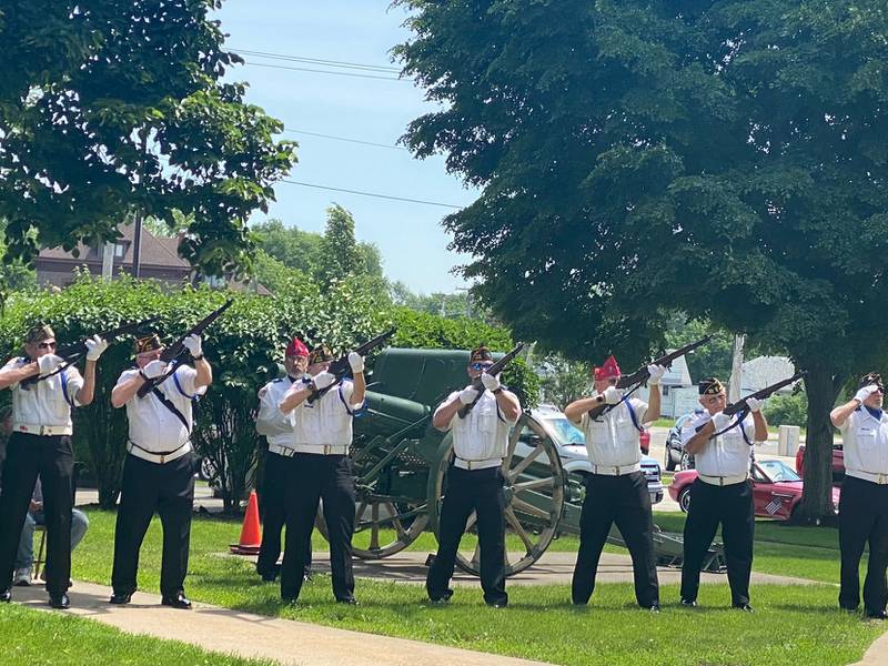 The Morris Color Guard gives the 21 gun salute on Monday during the Memorial Day ceremony.