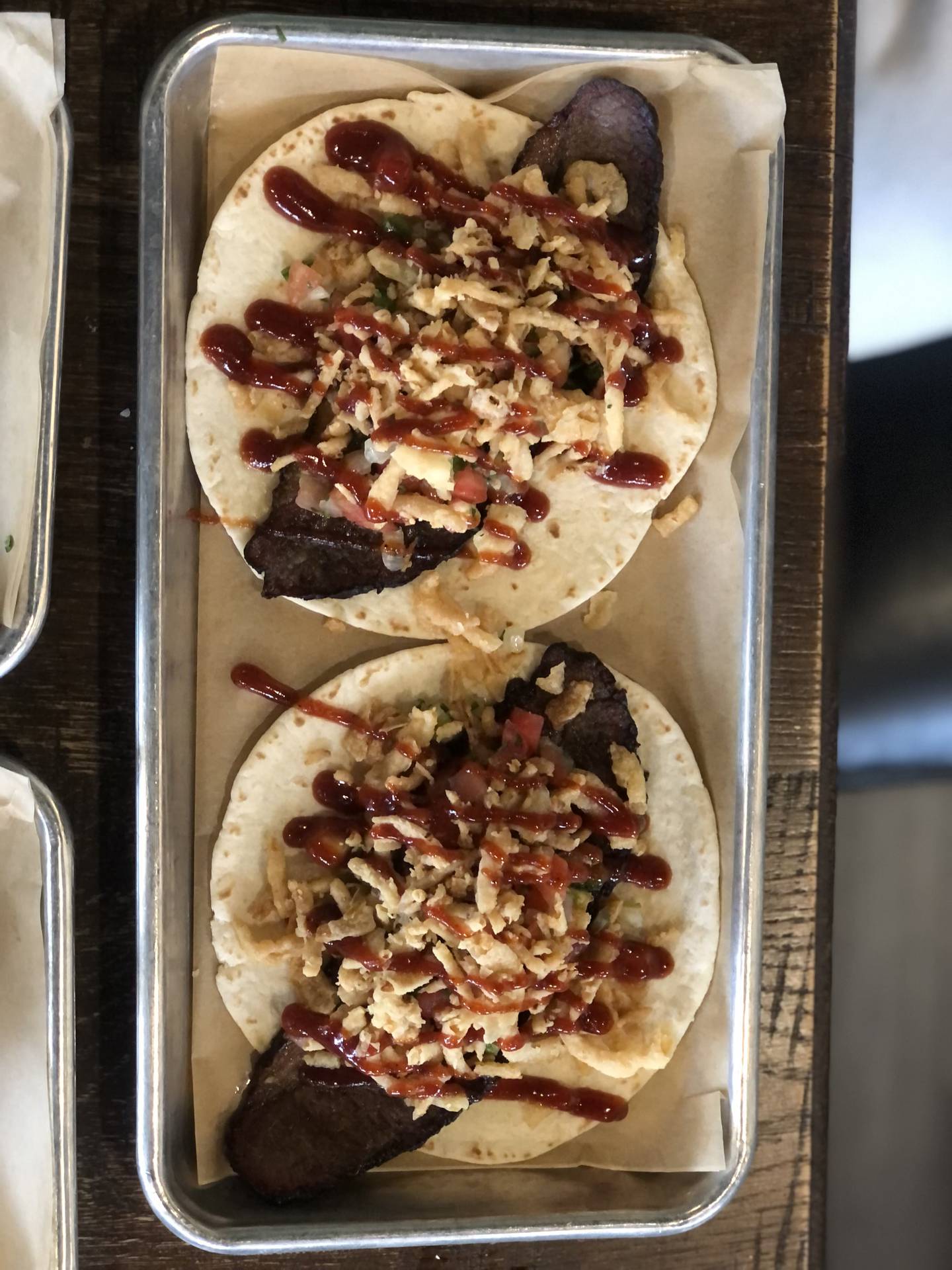 The Texan tacos at Cantina 52 were made with thinly sliced brisket and topped with crunchy onions and a nice, sweet Cattlemen’s barbecue sauce.