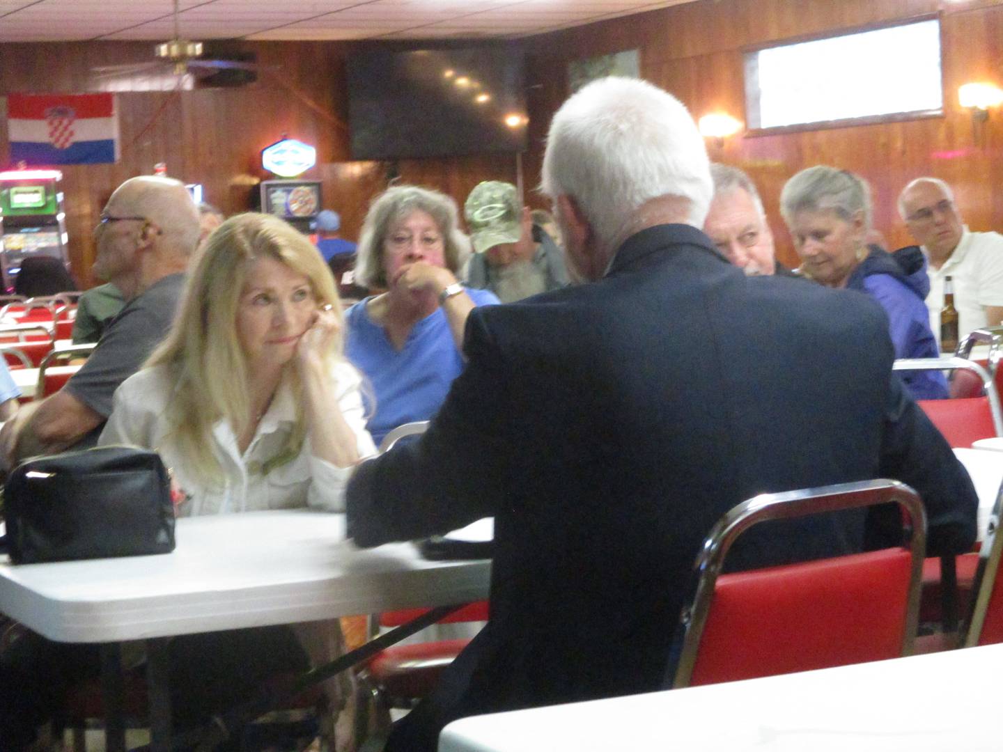 Joliet Councilwoman Jan Quillman listens to a point made during a neighborhood meeting held Wednesday on the stadium plan for Joliet Catholic Academy. June 18, 2025