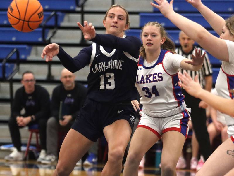 Cary-Grove’s Malaina Kurth dishes the ball against Lakes in varsity girls basketball action on Friday, Jan. 2, 2026  at Lakes High School in Lake Villa.